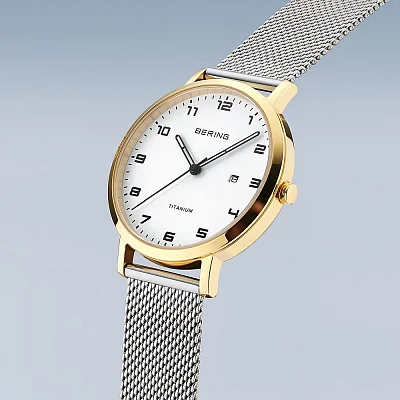 Bering Classic Lady Titanium Date Gold Mesh 18634-010